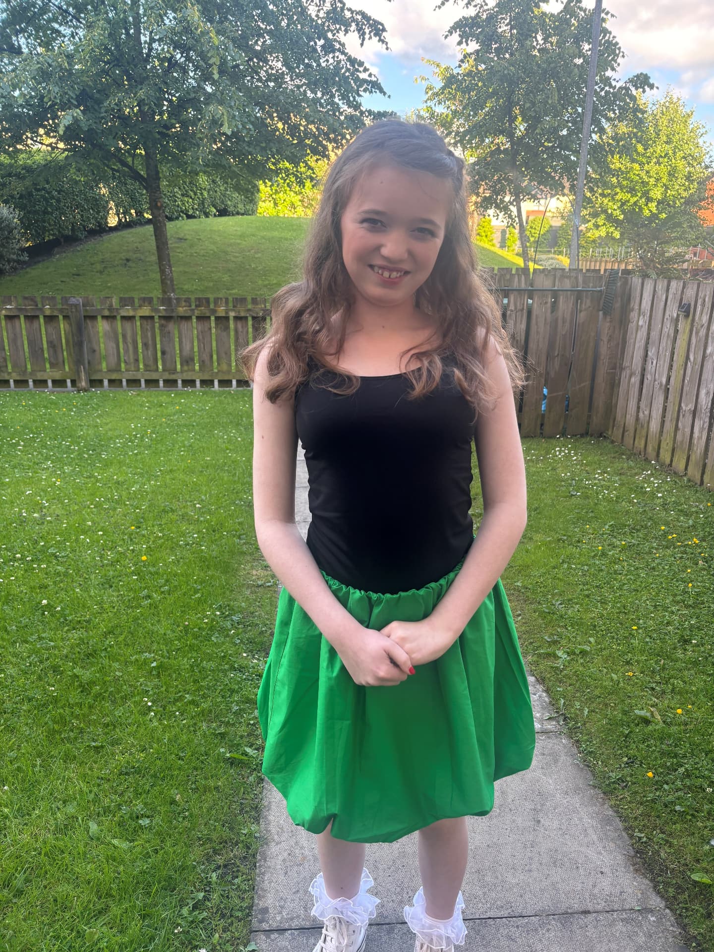 Olivia today, smiling and ready to dance